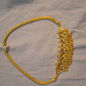 Gold tone and purple heavy fashion necklace